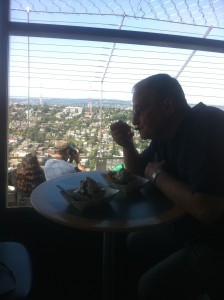 Michael eating a Mt. Ranier sunday on top of Needle